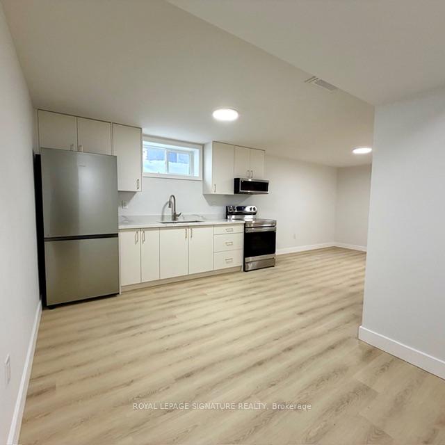 293 Glebemount Avenue Lower, Toronto E03 — photo 3 of 5
