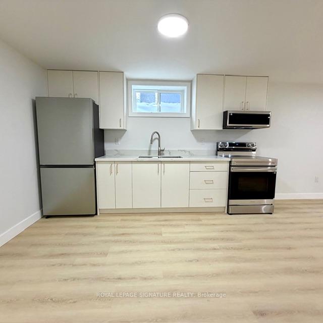 293 Glebemount Avenue Lower, Toronto E03 — photo 4 of 5
